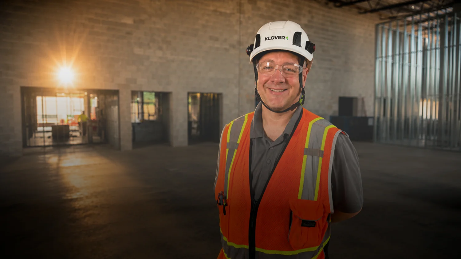 Klover construction team member wearing safety gear on site