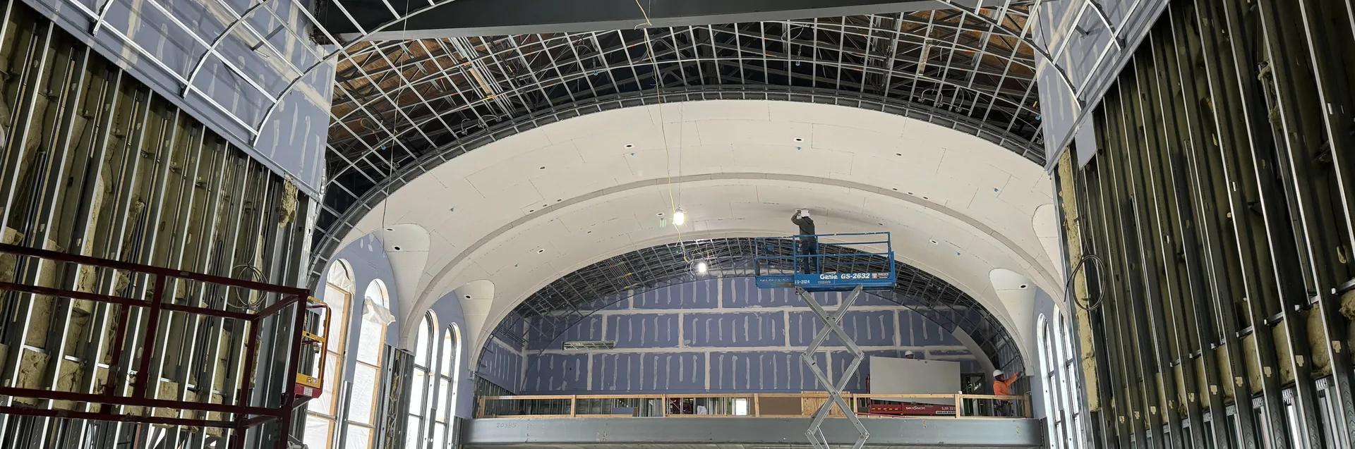 Klover panel installation project featuring curved ceiling framing